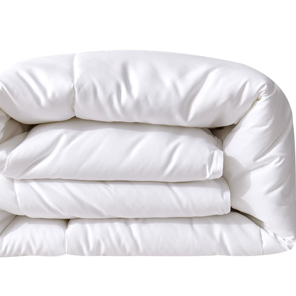 Folded white Bamboo Duvet White Insert on a white background