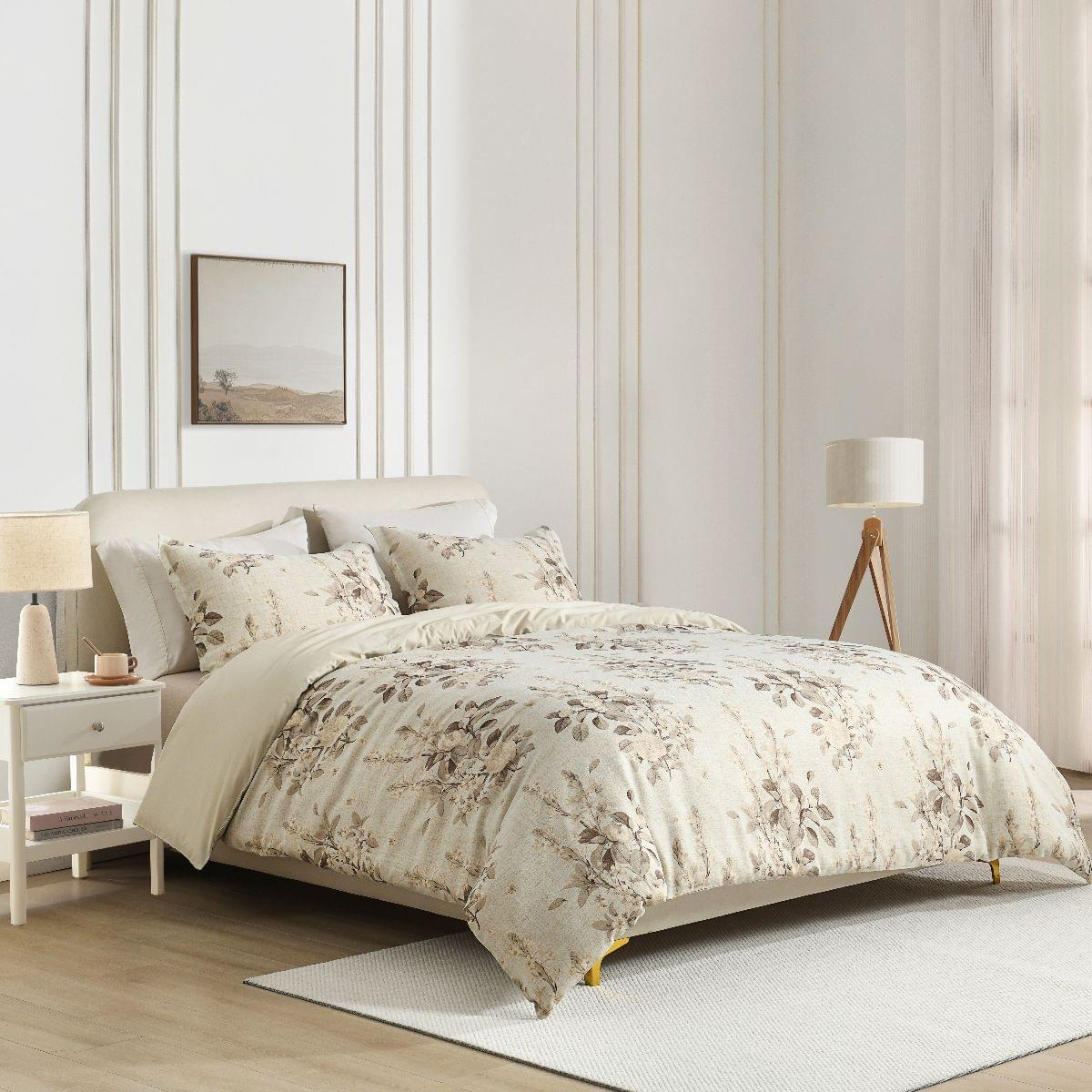 Neatly made bed with Floral Bouquet Comforter Set in a bedroom setting.