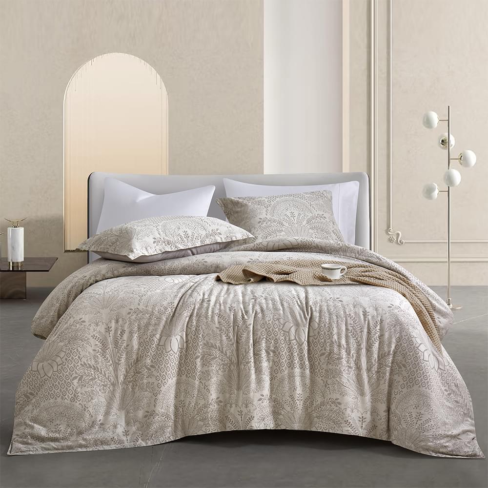 Neatly made bed with beige Timeless Heritage Woven Duvet Cover Set and pillows in a modern bedroom setting.