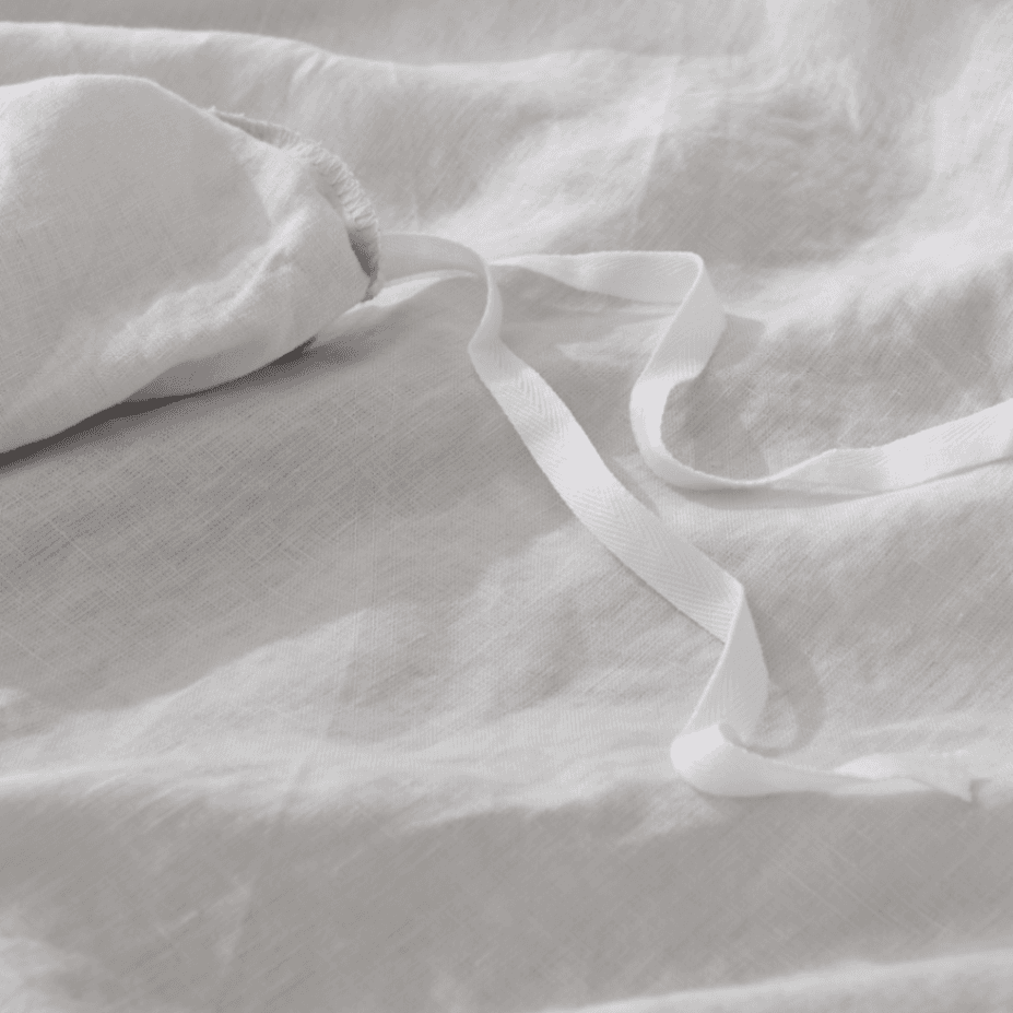 Close-up of white fabric with folds