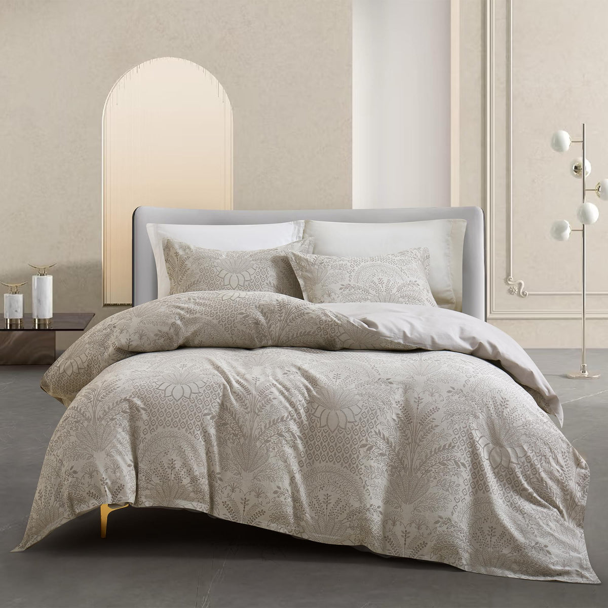 Neatly made bed with beige Timeless Heritage Woven Comforter Set and pillows in a modern bedroom setting.