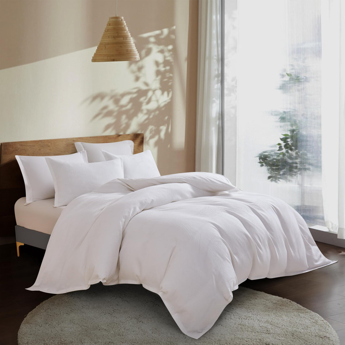 White Aurora Bloom Leaf Jacquard Duvet Cover Set White on a bed in a bright bedroom with natural light.