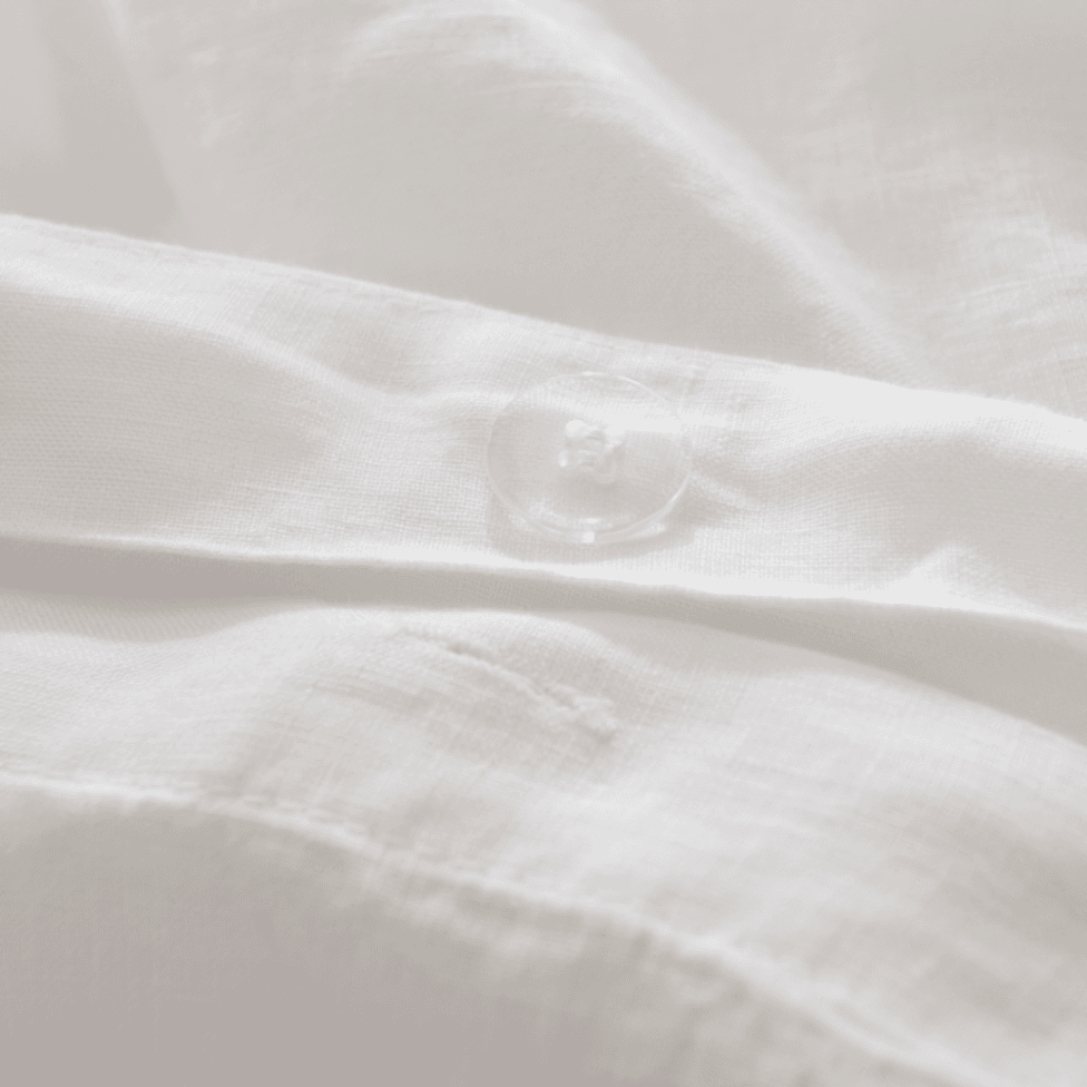 Close-up of white fabric with subtle texture