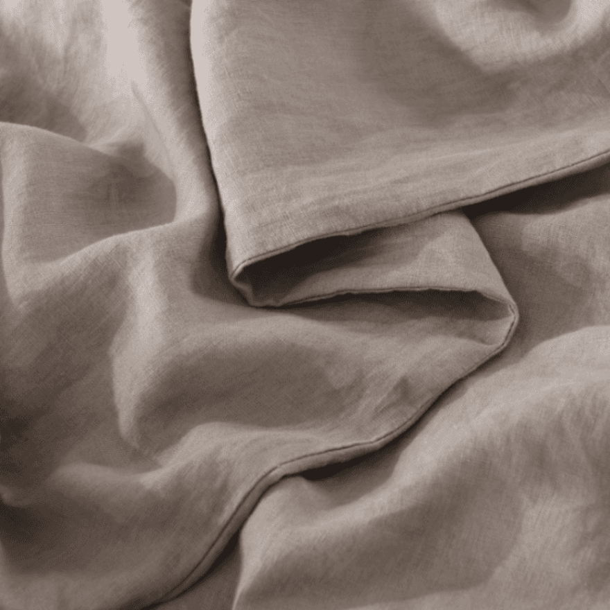 Close-up of beige fabric with folds