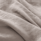 Close-up of beige fabric with visible texture