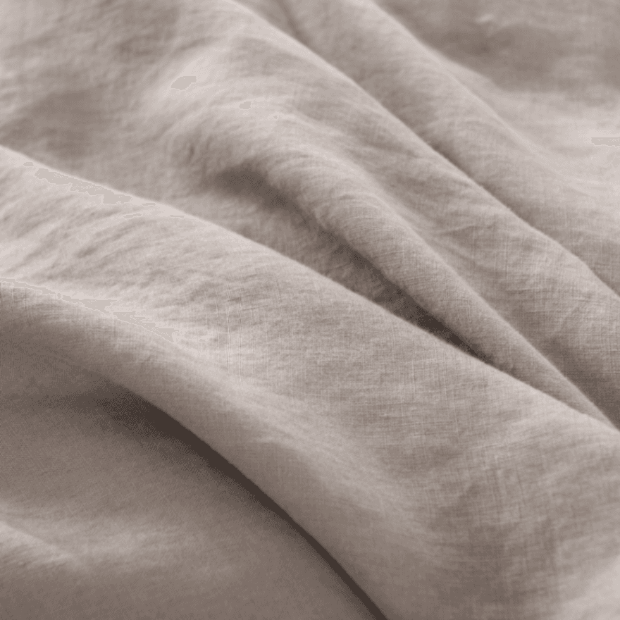 Close-up of beige fabric with visible texture