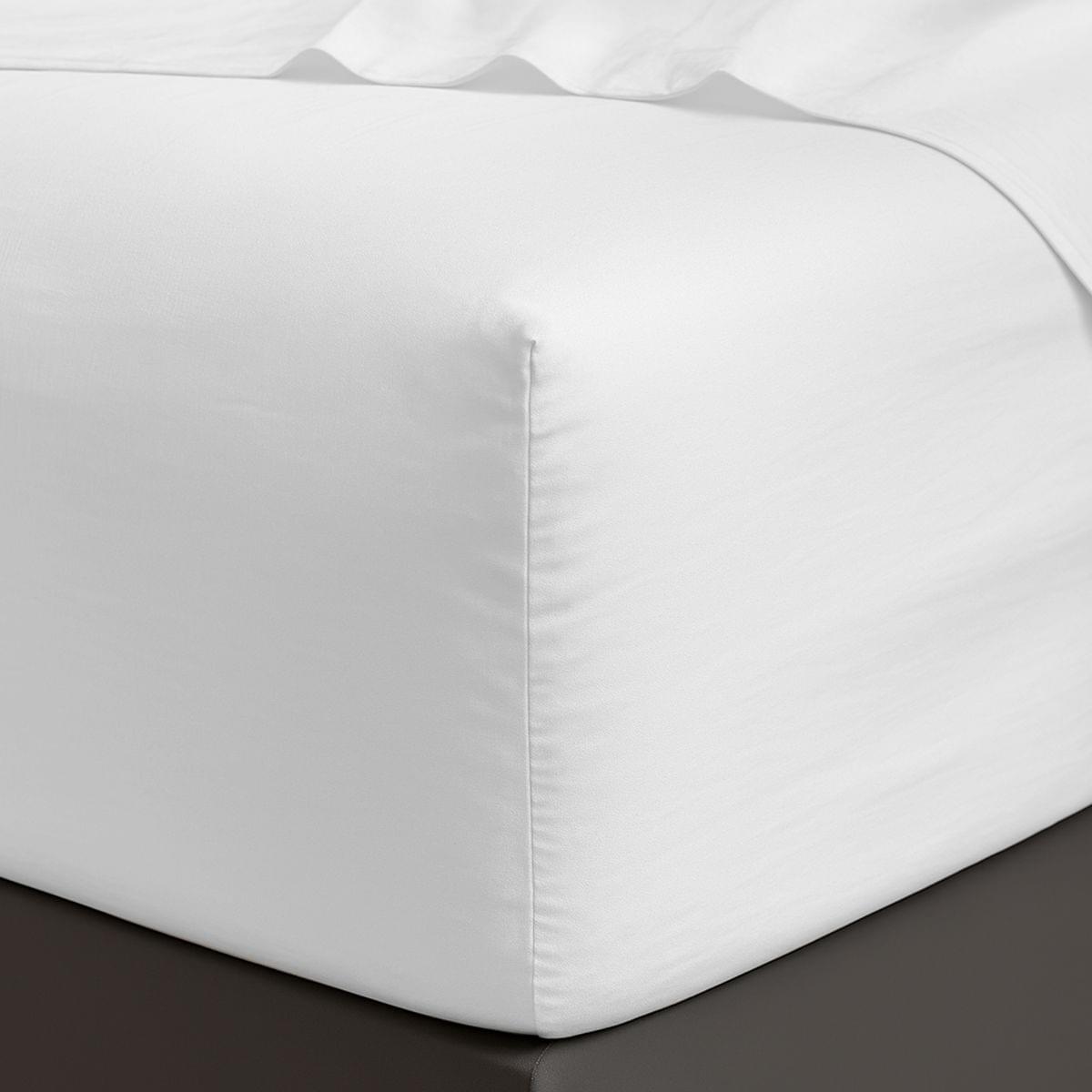 White fitted 100% Cotton Sheet Set 400 Thread Count on a bed corner with a plain background