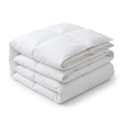 Folded white Down and Feather Duvet on a white background