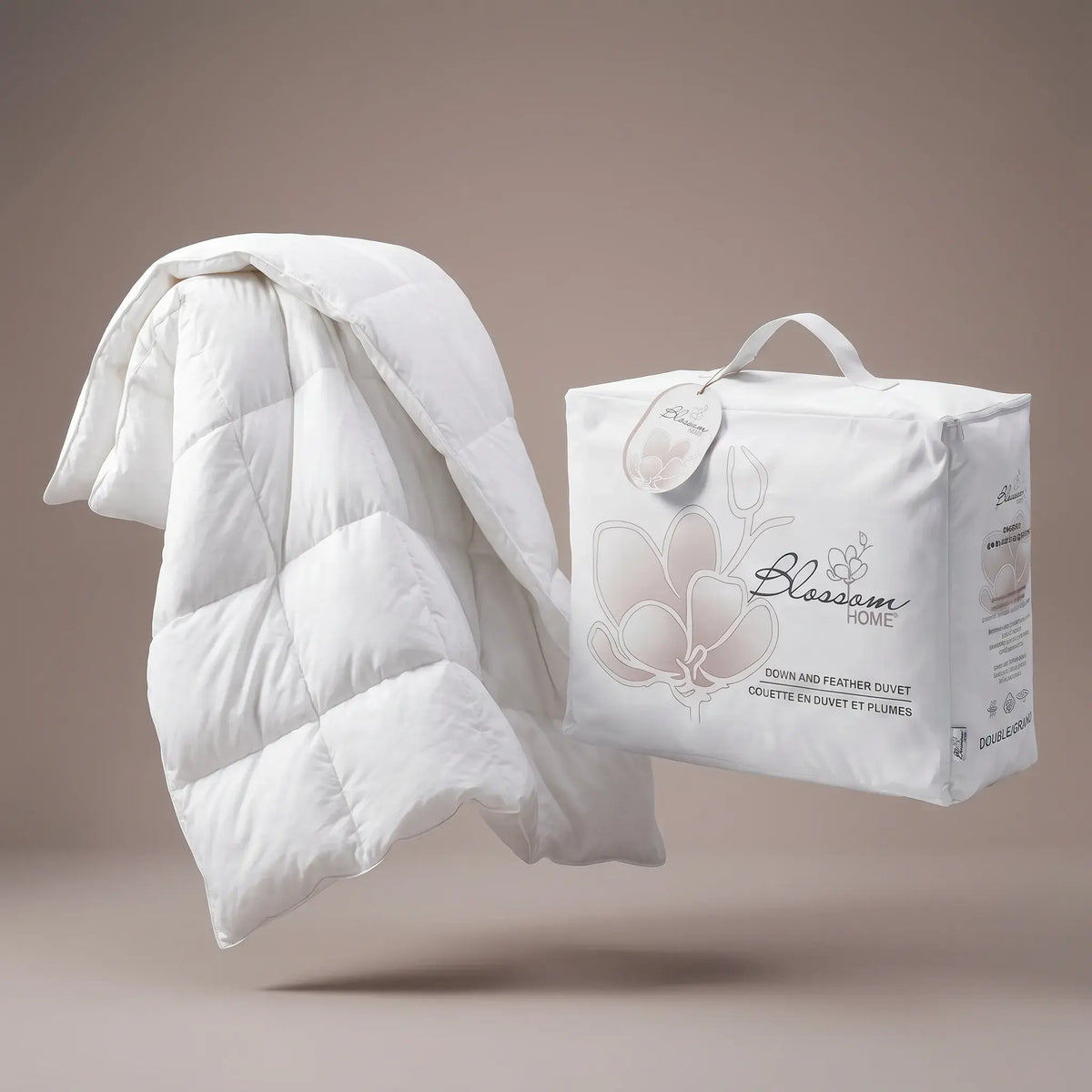 White Down and Feather Products Duvet with packaging on a beige background