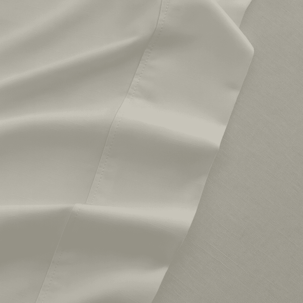 Close-up of beige fabric with folds