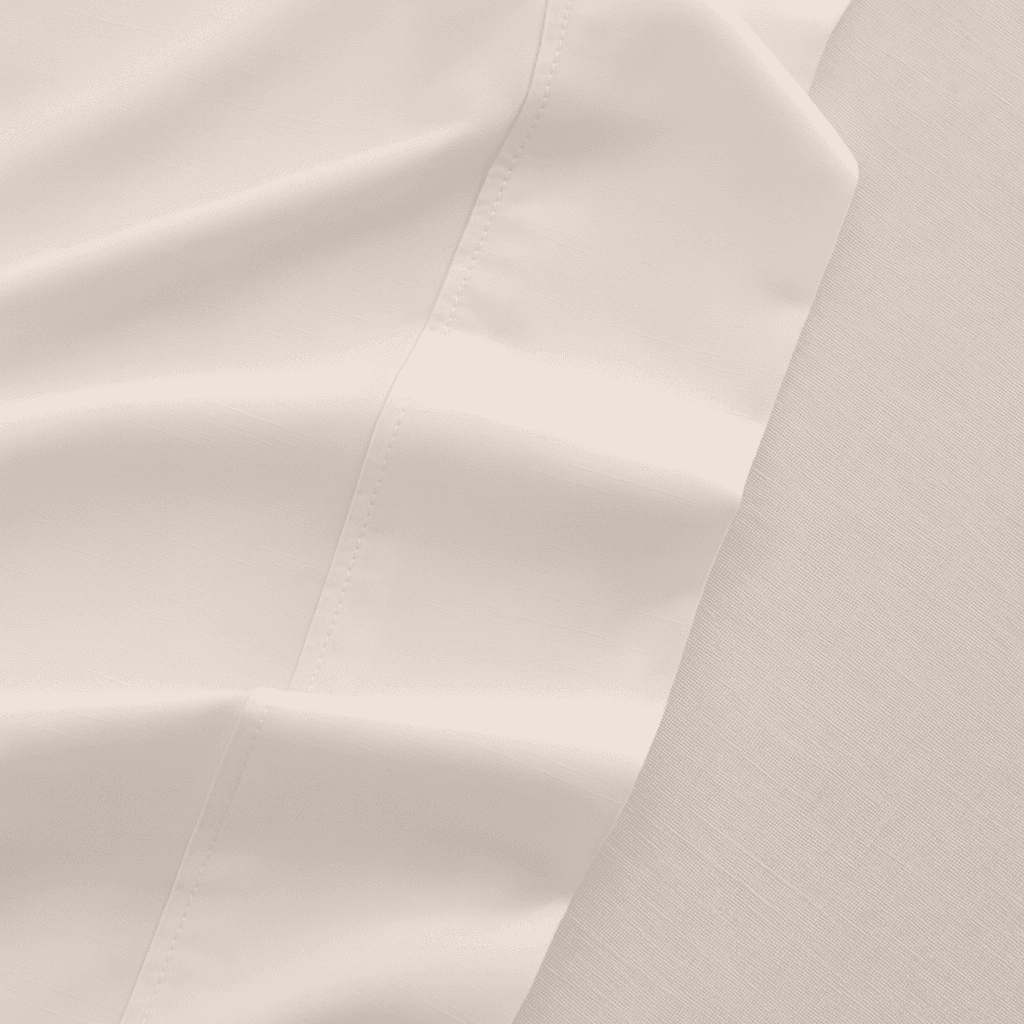 Close-up of beige fabric with folds