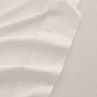 Close-up of beige fabric with folds