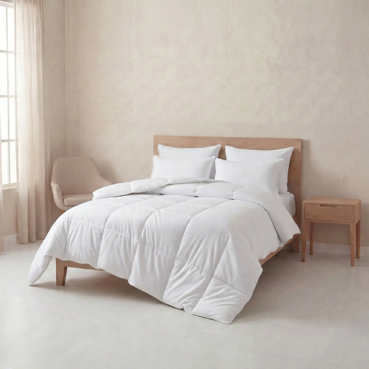 White White Goose Feather Duvet set on a wooden bed in a minimalistic room with beige walls and curtains.