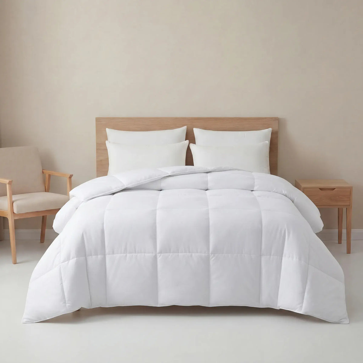 White White Goose Feather Duvet set on a bed in a bedroom with beige walls and furniture.