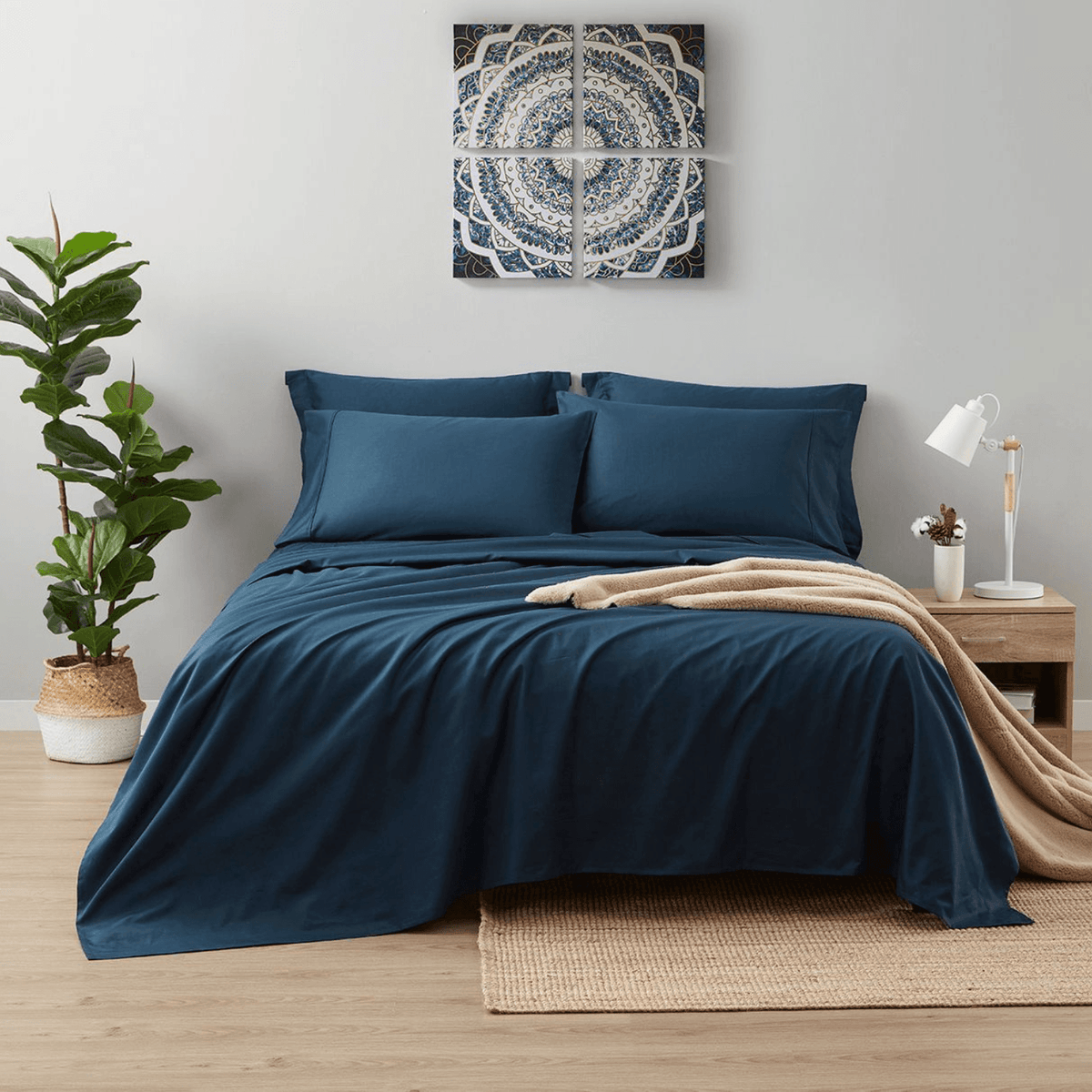 Bedroom with blue bedding and decorative elements