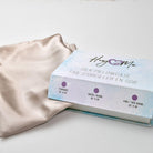 Silk pillowcase with packaging on a light background