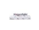 Set of folded bed sheets with Organic Cotton Printed Unicorn Duvet Cover Set on a white background