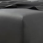Dark gray satin fabric with a subtle texture