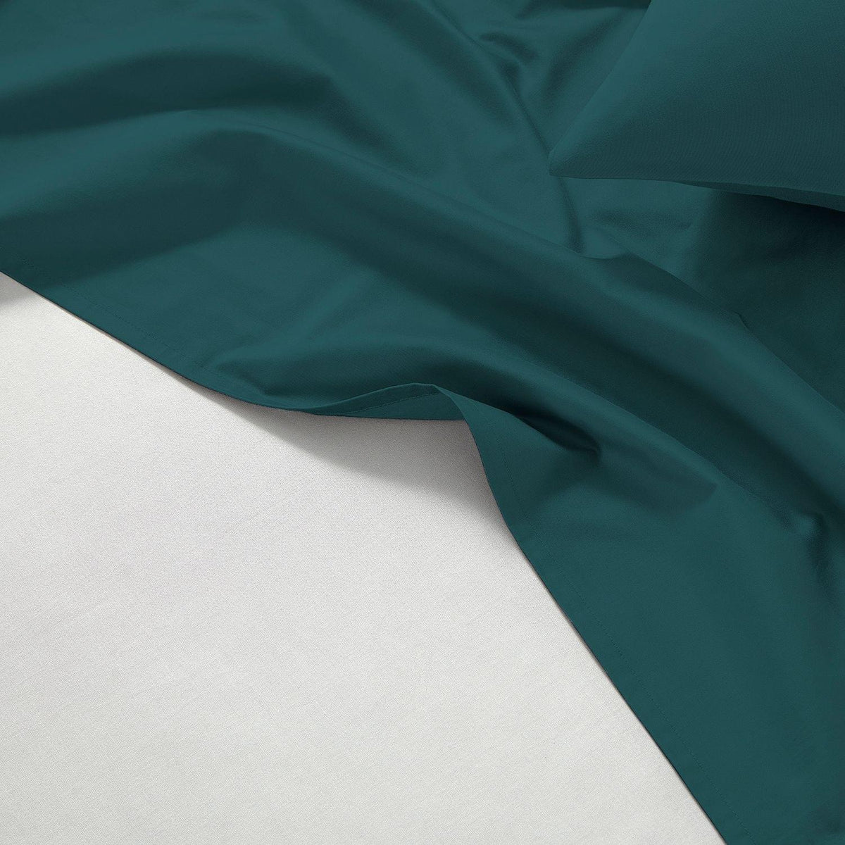 Teal fabric on a white background