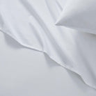 Close-up of white fabric with folds