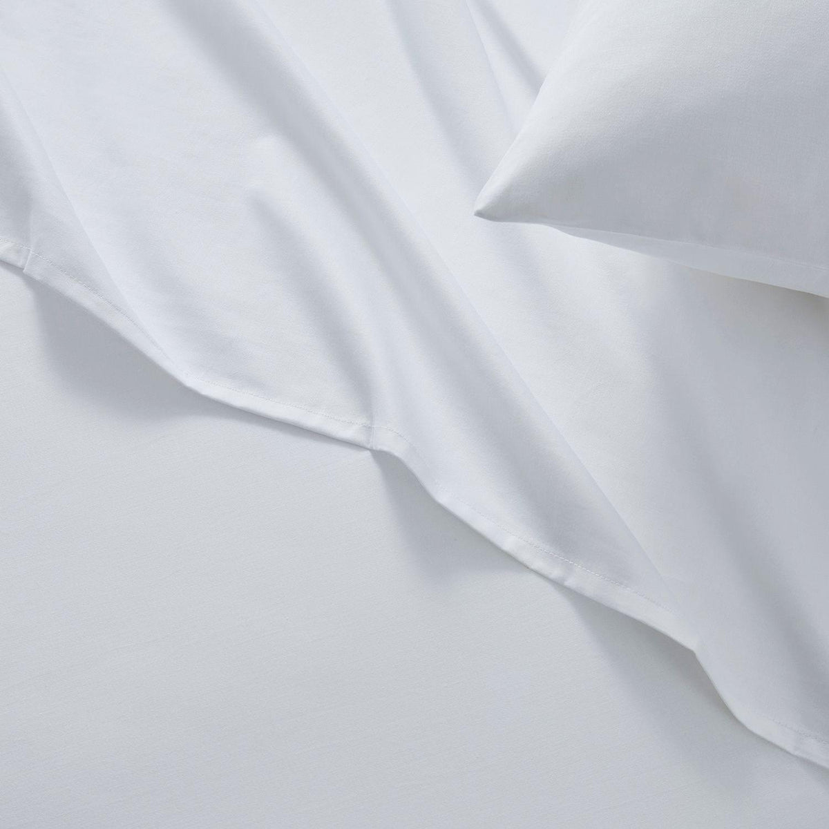 Close-up of white fabric with folds